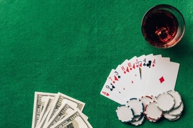 Live dealer table interface on laptop and phone